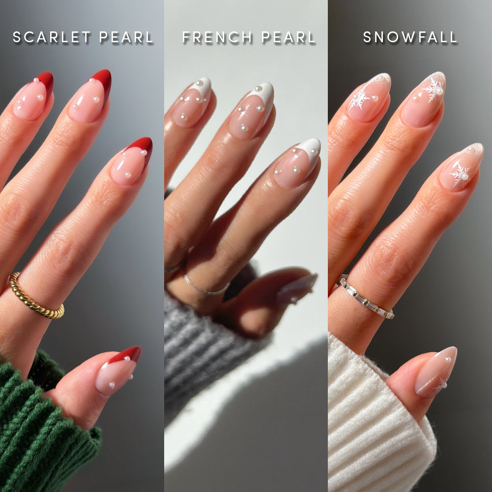 Glamnetic Pearls Under the Tree nails feature three short almond designs: Scarlet Pearl with red French tips, French Pearl with white French tips, and Snowflake with white snowflake details.