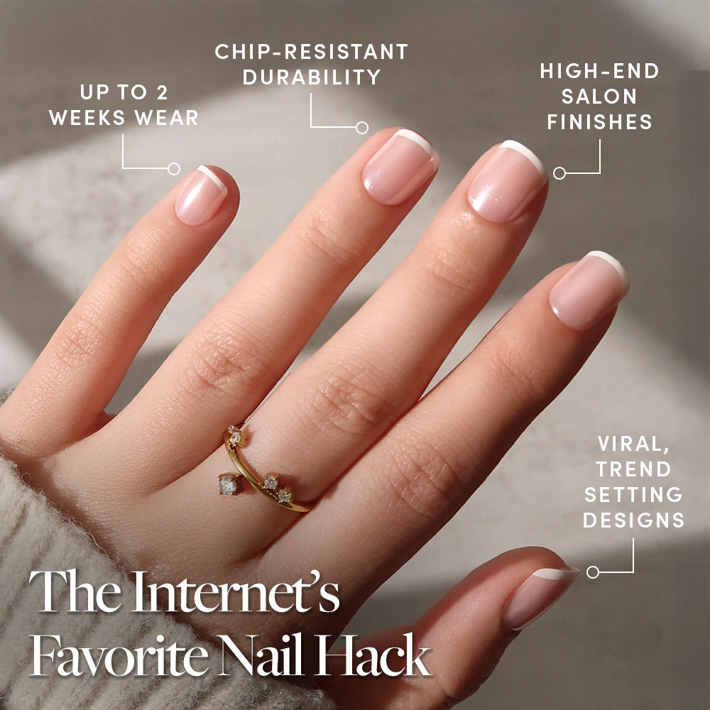 A hand with a gold ring showcases Pearly Please by glamnetic—neatly manicured, glossy French tips. Text highlights up to 2 weeks’ wear, chip-resistant durability, flawless salon finish, and trending designs. - Product image