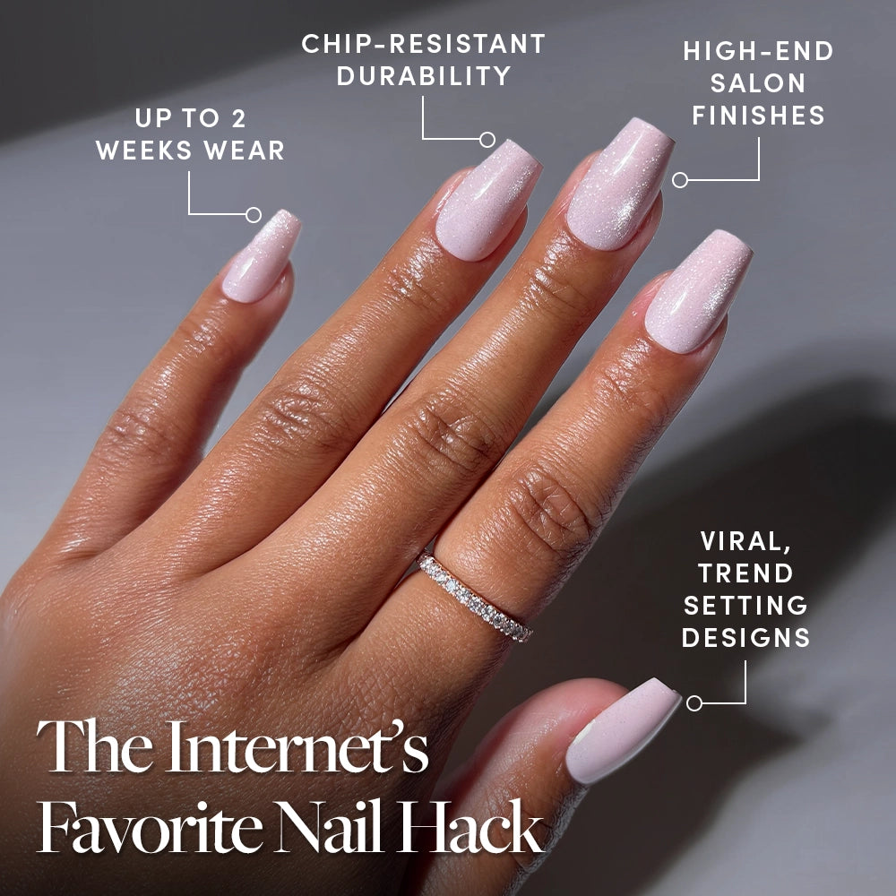 A hand with long, glossy, light pink coffin nails—Pink Secret by glamnetic—is shown. Text highlights up to 2 weeks wear, chip-resistant durability, salon-quality finish, and trendy designs. The hand wears a thin jeweled ring. - Product image