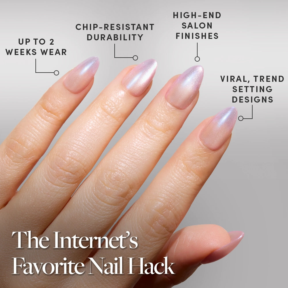 A hand with manicured, short almond nails features glamnetic’s Polar Day polish. Benefits include up to 2 weeks’ wear, chip-resistant durability, and viral velvet lilac color for high-end salon finishes and trend-setting designs. - Product image
