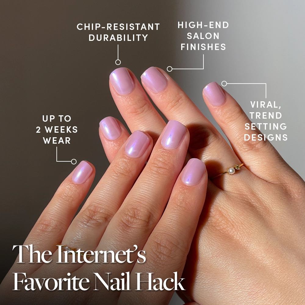 A close-up of hands with glossy, light purple Purple Pixie nails by glamnetic, featuring chip-resistant durability, high-end finishes, cruelty-free vegan nails, viral designs, and up to 2 weeks wear. Text: “The Internet’s Favorite Nail Hack.”. - Product image