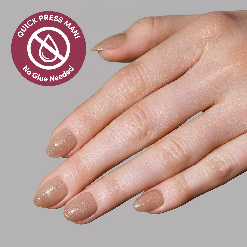 A hand with almond-shaped, sparkly brown stick-on nails from glamnetic; a circular icon reads QUICK PRESS MANI No Glue Needed with a crossed-out glue drop. Enjoy flawless, no-glue nails in seconds with Sparkly Brown from glamnetic. - Product image