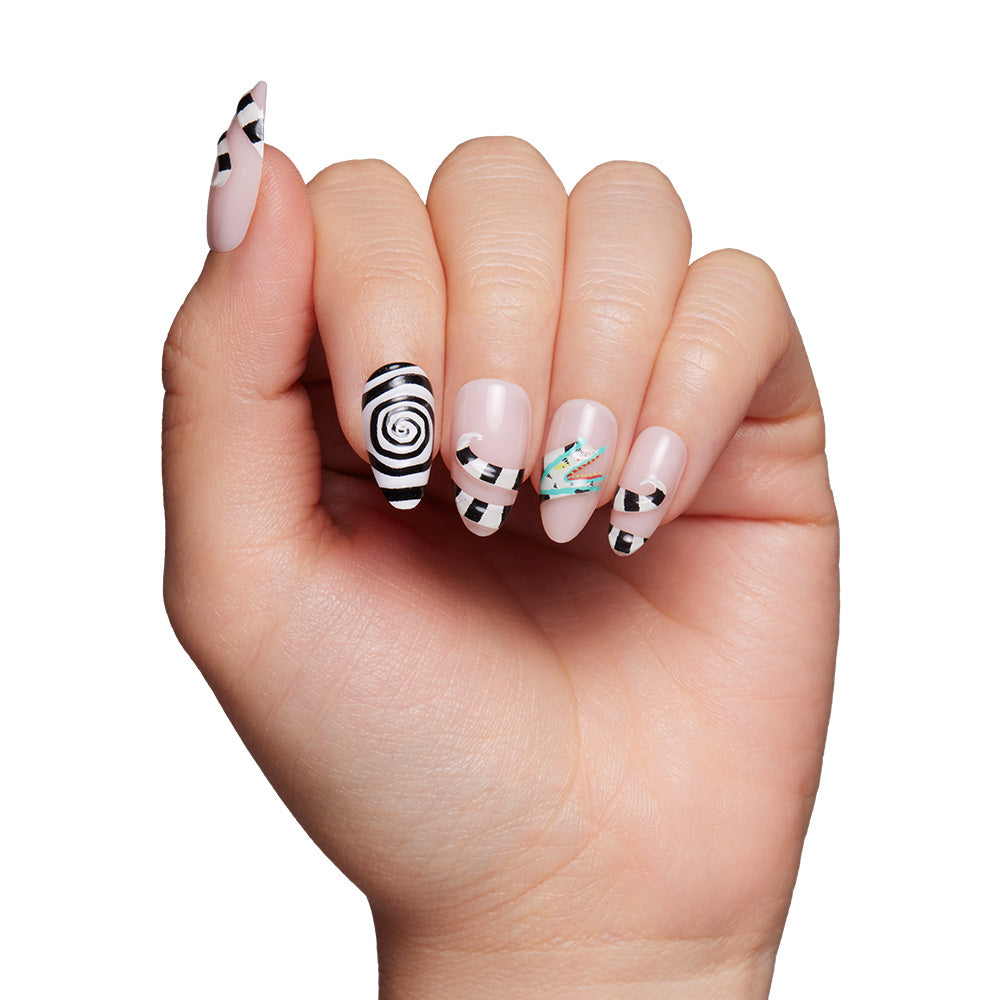 A manicured hand with black and white stripes inspired by the glamnetic Sandworm nail set, a spiral thumb, turquoise ring finger detail, and subtle 3D accents. The background is white. - Product image