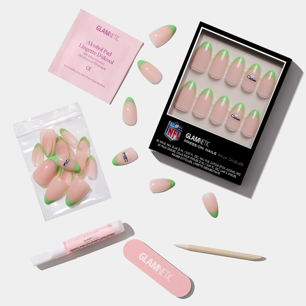 The glamnetic Seattle Seahawks Press-On Nail Set features almond-shaped team nails with green tips, a pink nail file, wooden cuticle stick, glue tube, alcohol pad, and extra nails—everything you need for perfect fan nails. - Product image