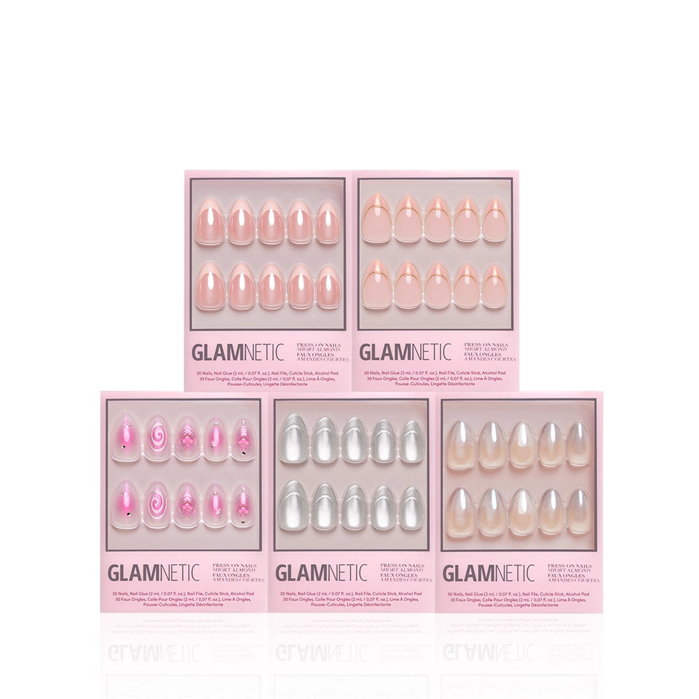 Four GLAMNETIC press-on nail sets arranged in a pyramid on a white background. The top set features iridescent pink nails, the upper-middle set shows nude pink nails, the lower-left set has pink glittery nails, and the lower-middle set displays metallic silver nails, while the bottom-right set shows iridescent beige nails. - Product image