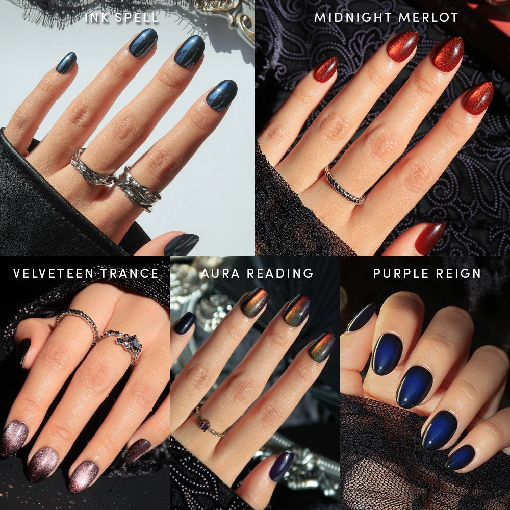 Five hands with manicured nails showcase a range of shimmery shades from the glamnetic Short Spells collection: dark blue (Ink Spell), deep red (Midnight Merlot), mauve (Velveteen Trance), iridescent (Aura Reading), and dark purple (Purple Reign). These no-glue press-on nails provide ultimate convenience for effortless manis and come in an extra short set, perfect for everyday elegance.