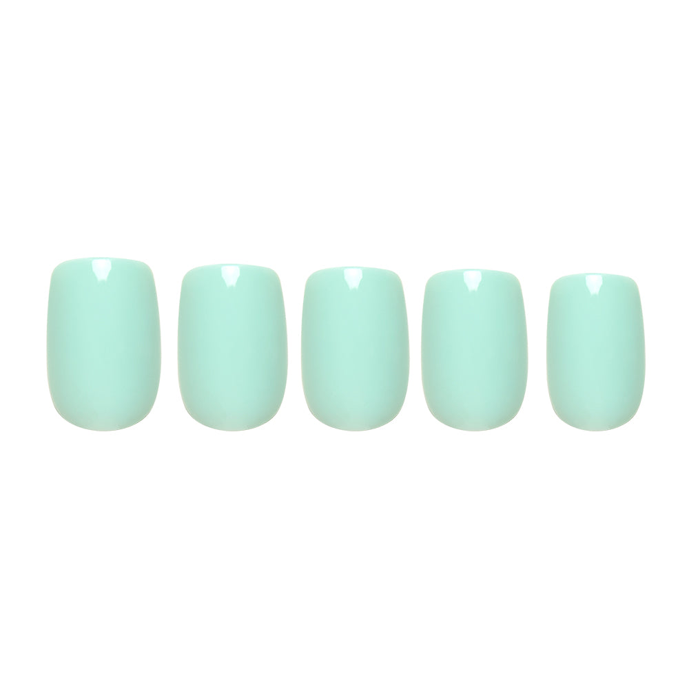 Five short squoval press-on nails in a glossy soft teal shade from glamnetic, arranged on a white background. The Soft Teal set offers an elegant, effortless look. - Product image