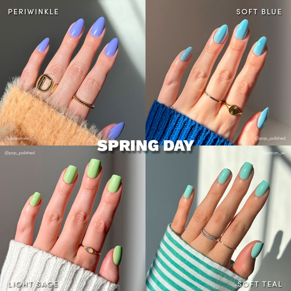 Four hands show pastel spring manicures in periwinkle, soft blue, light sage, and teal. Each wears coordinating rings and sweaters. “SPRING DAY” appears. Try glamnetics Spring Day Bundle for easy press-on nails in these fresh shades!.