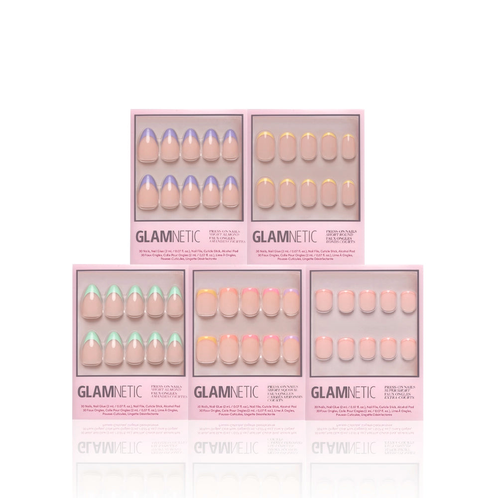 Five boxes of glamnetic’s Spring French Tip Collection are arranged in two rows. Each features pastel French tip designs on almond-shaped nails, with pink packaging and clear windows showing the colorful styles inside. - Product image