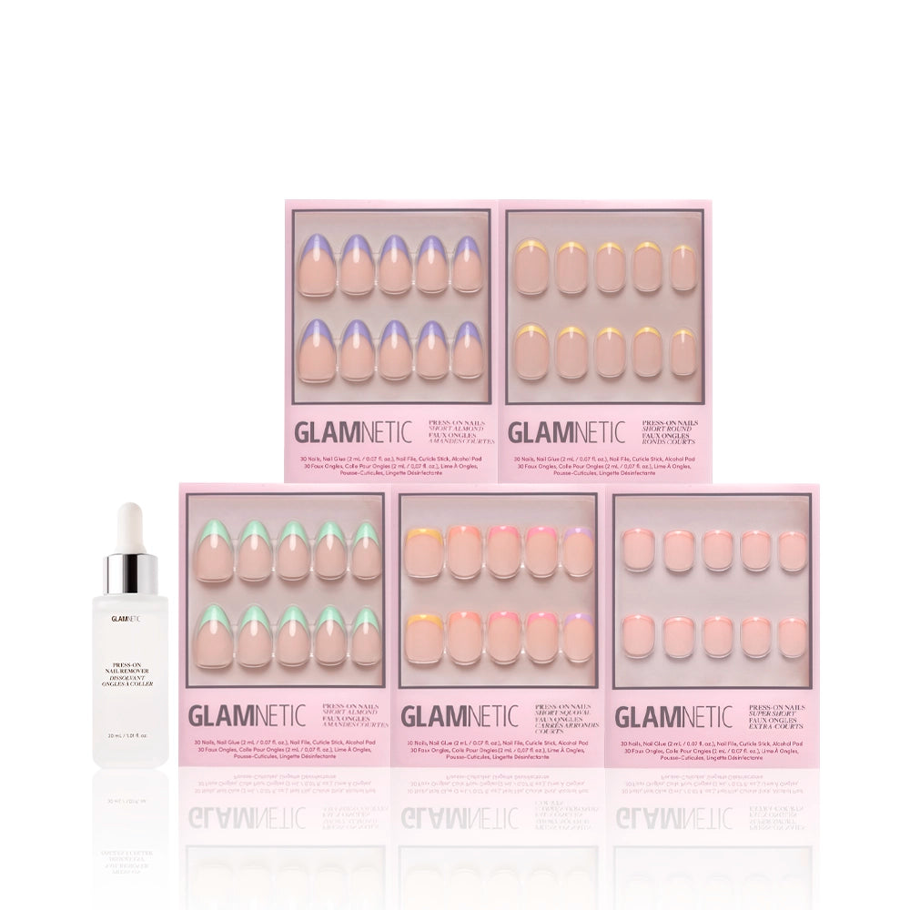 Five boxes of glamnetics Spring French Tip Collection are stacked in a pyramid, with a glamnetic cuticle oil dropper bottle placed to the left in front of the boxes, all displayed against a clean white background. - Product image