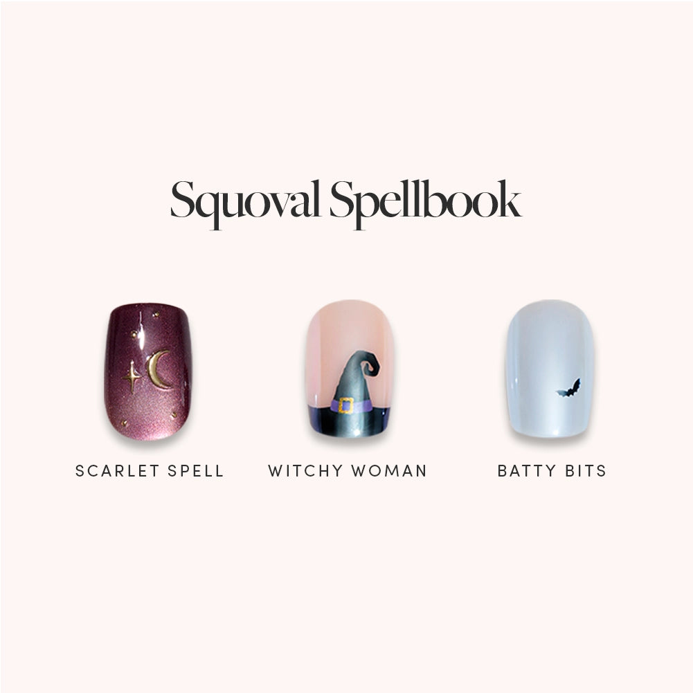 Three short squoval press-on nails from glamnetic’s Squoval Spellbook collection—Scarlet Spell (maroon with a gold moon), Witchy Woman (nude with a witch hat), and Batty Bits (white with a small bat)—deliver a salon-quality manicure in minutes.