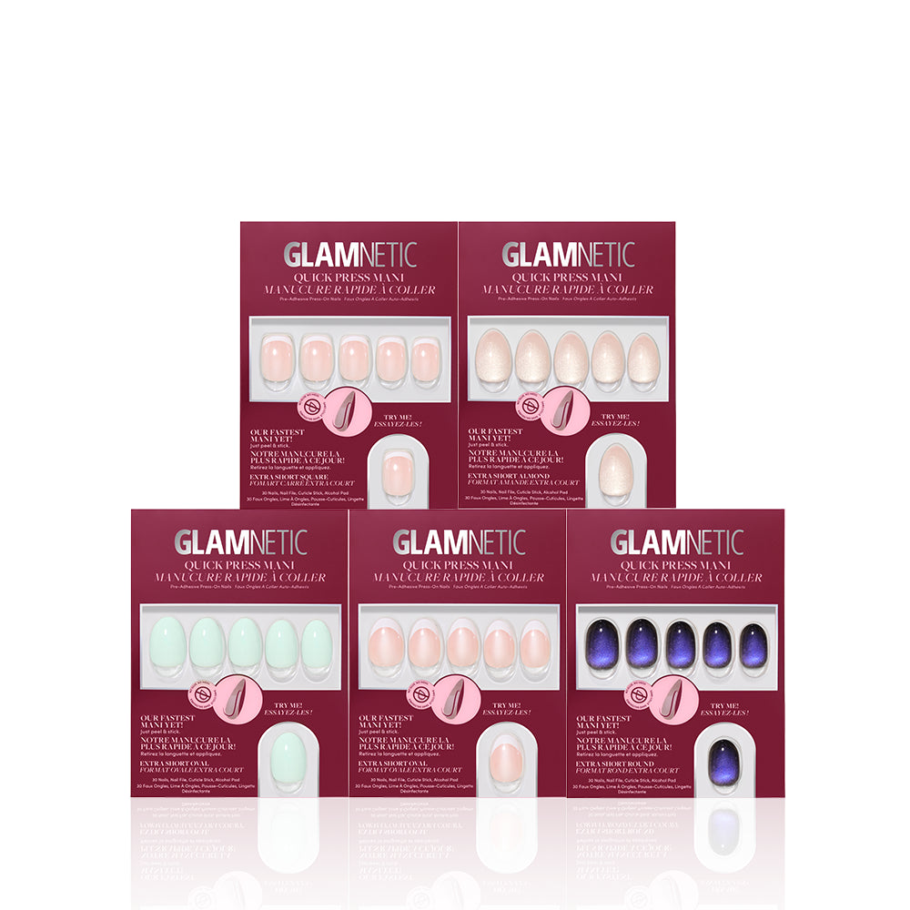 Five boxes of glamnetic Stick Downtown press-on nails in various colors—pastel green, nude pink, sparkly white, peach pink, and dark glittery purple—arranged in a pyramid formation on a white background. This bundle features Quick Press Manis for flawless, no-glue nails in minutes. - Product image