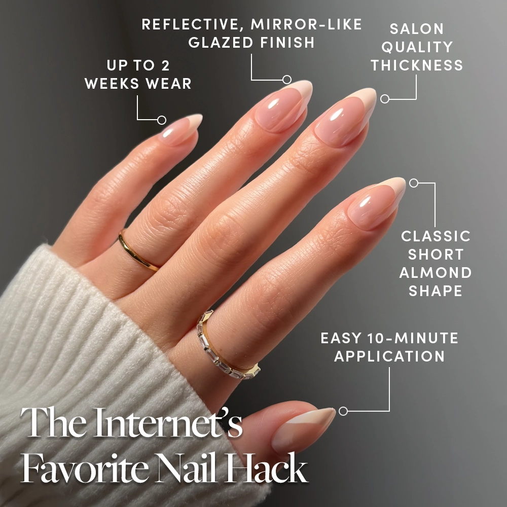 A hand with manicured, short almond-shaped nails is shown, highlighting benefits: mirror-like finish, salon quality, up to 2 weeks of wear, and easy 10-minute application. Featuring the glamnetic Strawberry Icing Press-On Nail Set for glazed French tip nails. Text reads: The Internet’s Favorite Nail Hack. - Product image