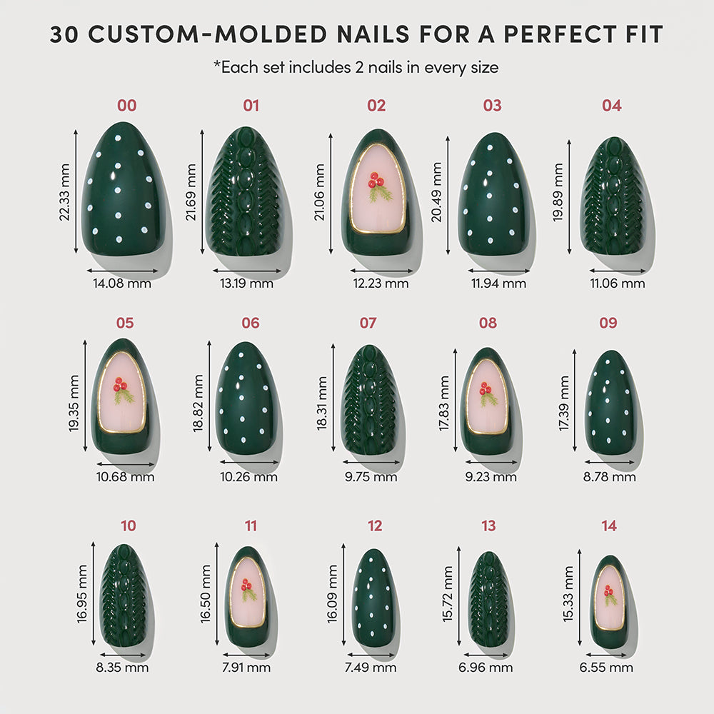 A Table for Ten sizing chart for 30 press-on nails labeled 00 through 14, displaying holiday manicure designs with white dots or holly leaf accents and measurements in millimeters for each size. - Product image