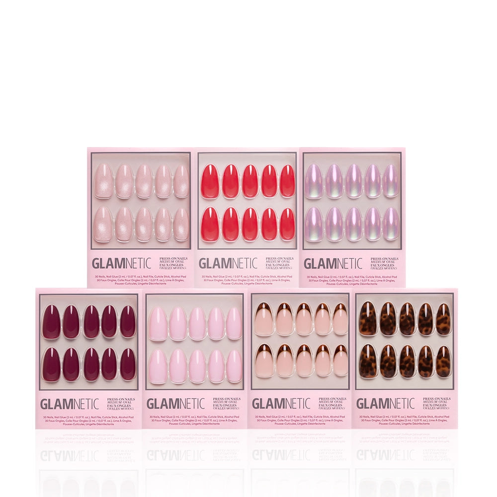 Six boxes of glamnetic’s The Medium Oval Edit, showcasing nude, red, lavender, maroon, pink, rose gold, and tortoiseshell medium oval nail sets, are arranged in two rows on a white background. - Product image