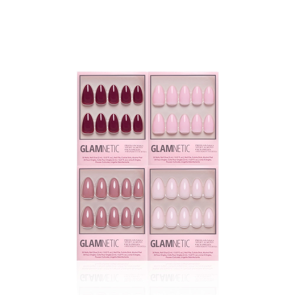 Four sets of The Pink Short Almond Icons press-ons by glamnetic, in pink and mauve hues, are shown in rectangular boxes arranged two-by-two on a white background. - Product image