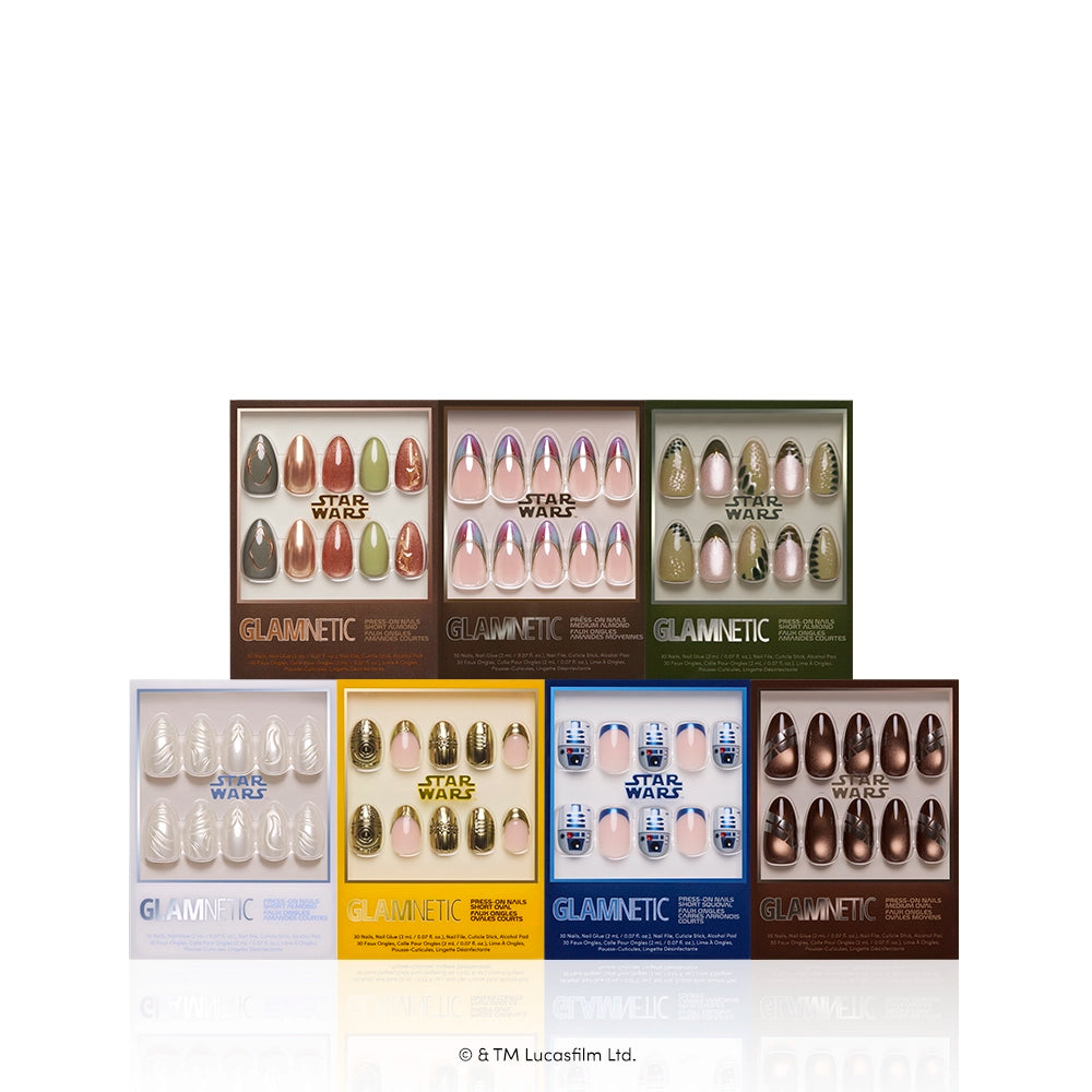 The Rebellion - Seven “The Rebellion” press-on nail sets by glamnetic are showcased in a row, each featuring distinctive colors and designs inspired by characters and elements from the Star Wars universe. This glamnetic bundle is perfect for fans eager to display their love for the iconic saga through stylish and unique nail art.