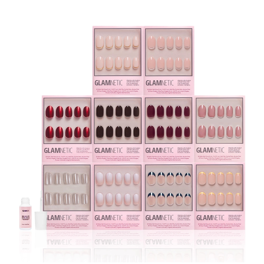 The Round Vault by glamnetic features limited-edition short round press-on nails in red, nude, pink, and French tip designs. Each set comes in pink packaging with nail glue—perfect for creating a stylish nail bundle. - Product image