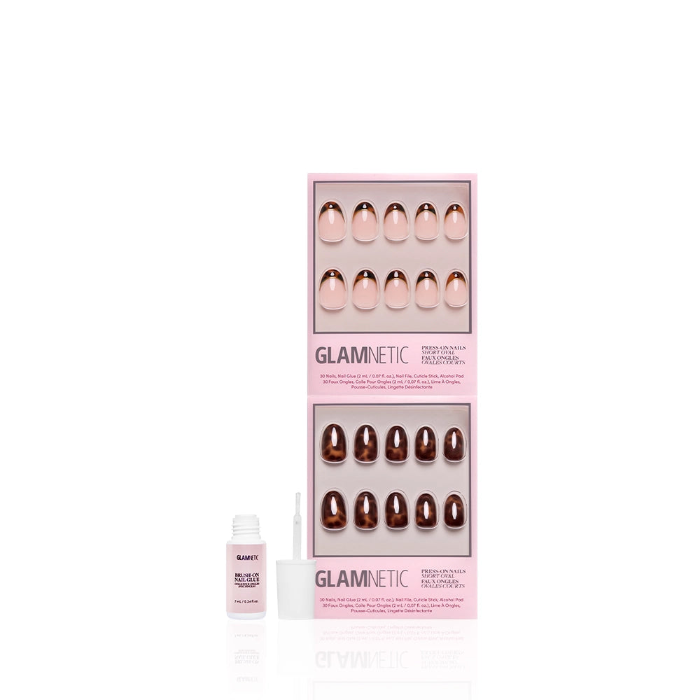 The glamnetic Short Oval Tortoiseshell Duo features pink and brown press-on nails in pink packaging, shown with a small white nail glue bottle and an open applicator on a white background. - Product image
