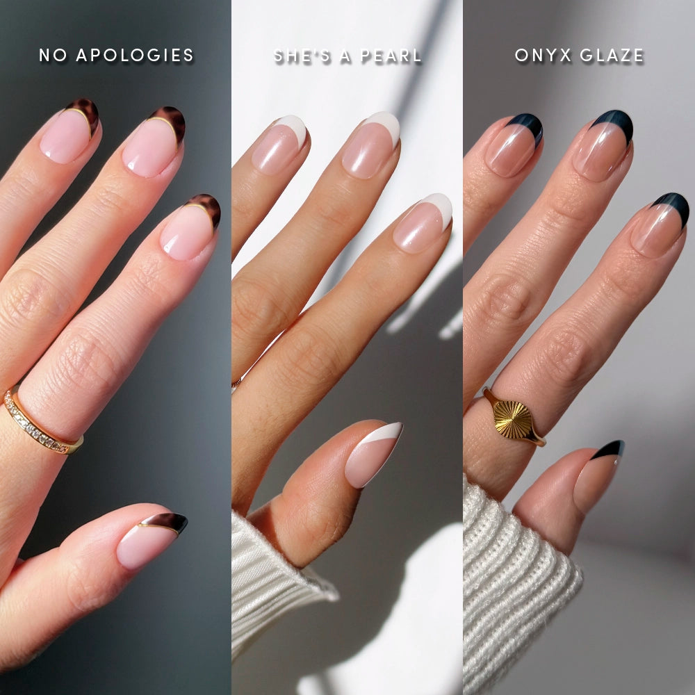 Three manicured hands wearing glamnetic’s The Short Round Frenchies are shown side by side, each with a different French tip—tortoiseshell, white pearl, and glossy black—and accessorized with a gold ring.