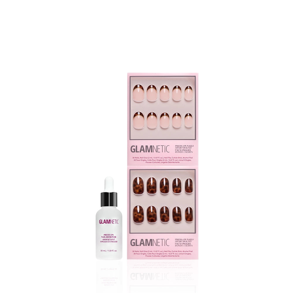 A bottle of glamnetic nail glue with a dropper is placed next to The Short Round Tortoiseshell Duo, featuring pink and trendy tortoiseshell press-on nails in rectangular packaging, all displayed against a white background. - Product image