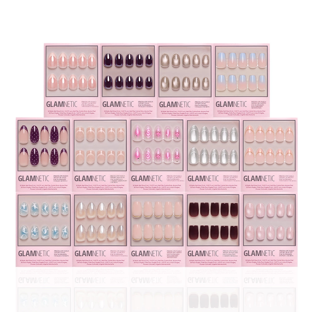 Twelve GLAMMETIC press-on nail sets arranged in a grid on a white background, showcasing various colors and styles including nude, purple, beige, pink, silver, and blue. - Product image