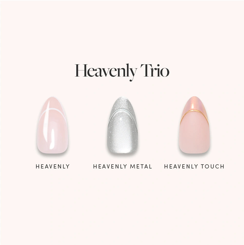Three salon-quality glamnetic press-on nails from the Heavenly Trio set, featuring shades in nude pink (Heavenly), metallic silver (Heavenly Metal), and nude pink with a gold accent (Heavenly Touch), are displayed beneath the text “Heavenly Trio.”. - Product image