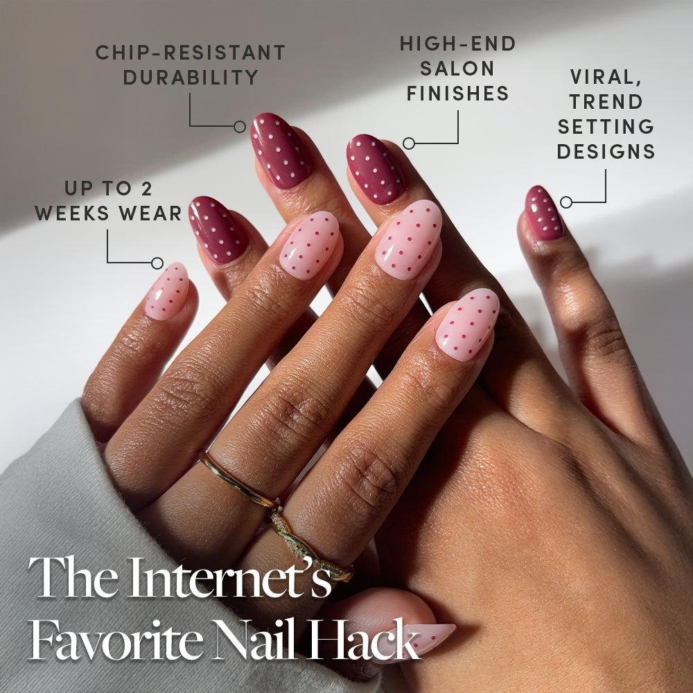 A hand with Cute As Cherry Pie red and pink polka dot short oval press ons by glamnetic is shown, featuring chip-resistant durability, up to 2 weeks’ wear, high-end salon finish, and viral vegan cruelty-free nails. The caption: The Internet’s Favorite Nail Hack. - Product image