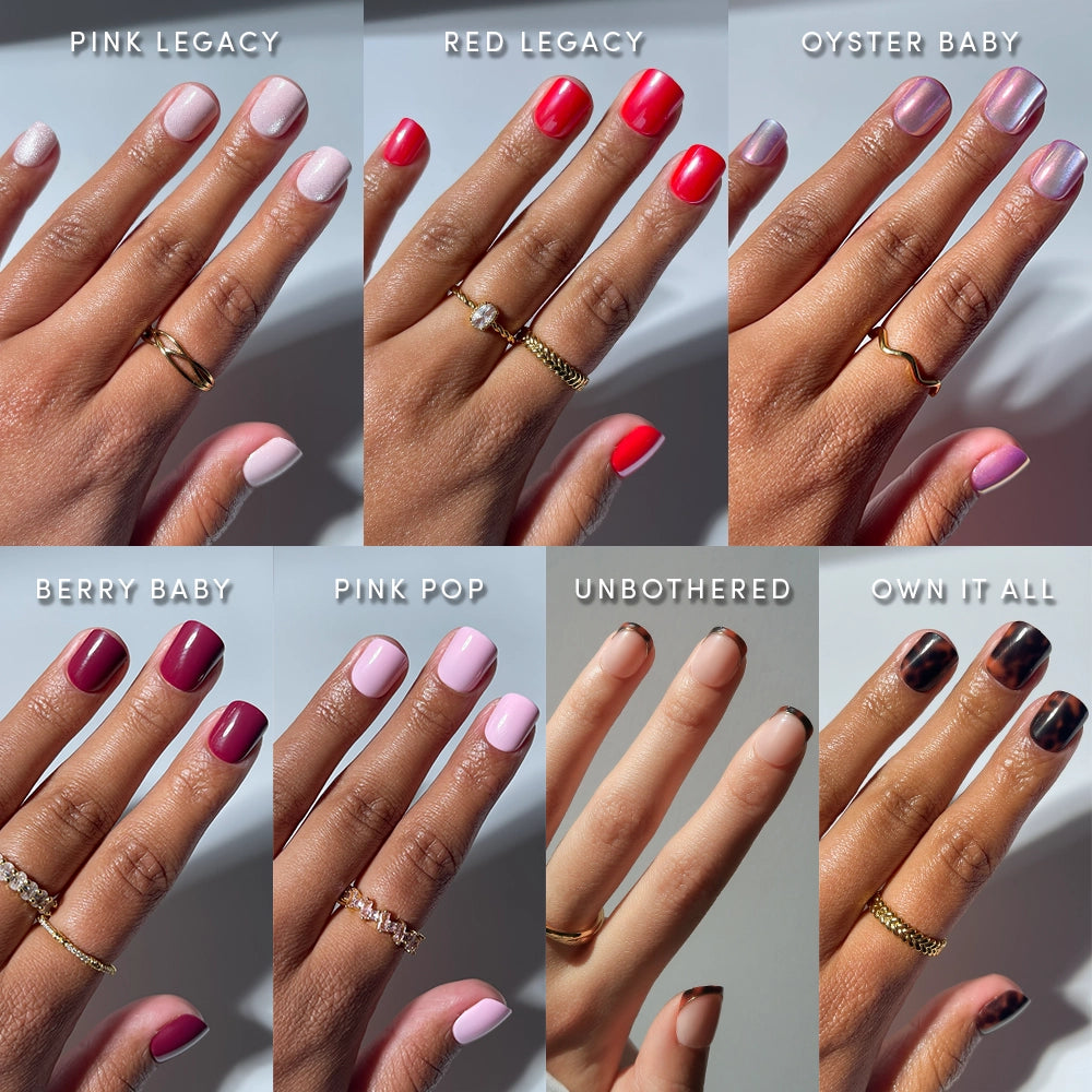 Eight hands display glamnetic’s The Super Short Edit, a glossy press-on nail bundle with super short styles in shades like light pink, red, nude, and berry, featuring names such as Pink Legacy, Oyster Baby, and Own It All.