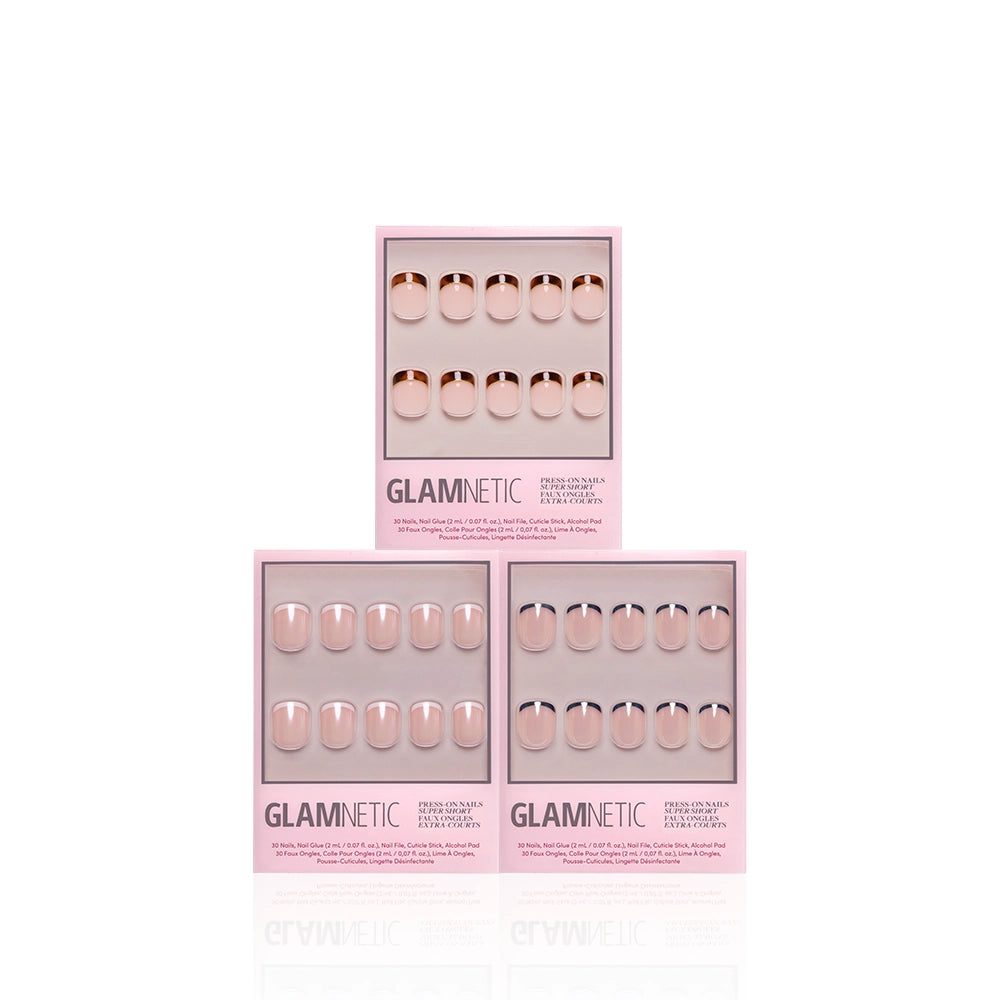 Three pink glamnetic boxes of The Super Short Frenchies press-on nails are shown against a white background. Each box displays neat rows of nude, super short artificial nails. - Product image