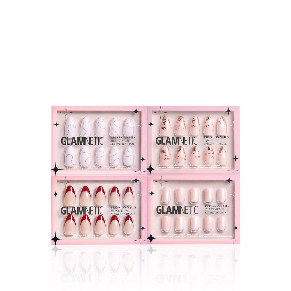 Four boxes of glamnetic Tinsel Tips almond press-ons are arranged in two rows, each with a unique design—abstract lines, gold flakes, red tips, and a natural nude finish—all in vegan, cruelty-free pink packaging.
