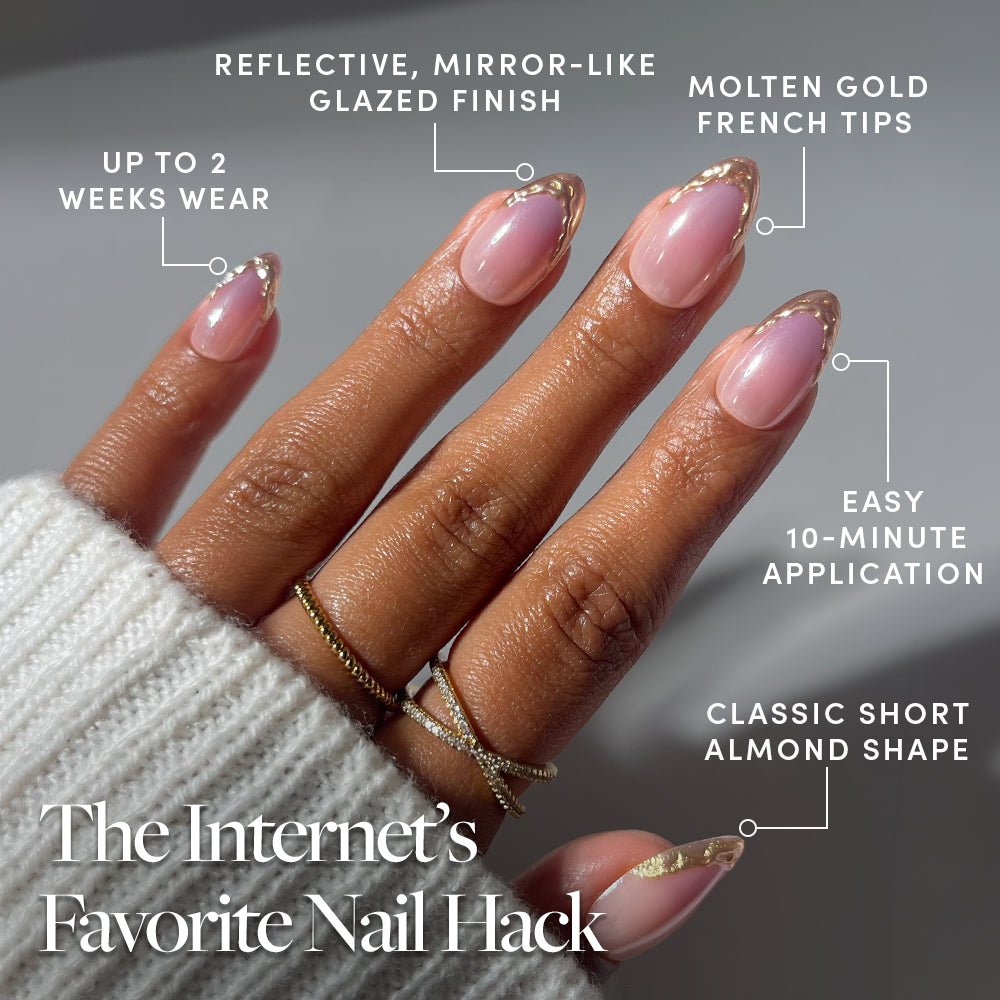 Glamnetic Tipped in Gold short almond nails featuring sheer pink polish with molten gold French tips, including details on the finish, two-week wear, and application time. - Product image