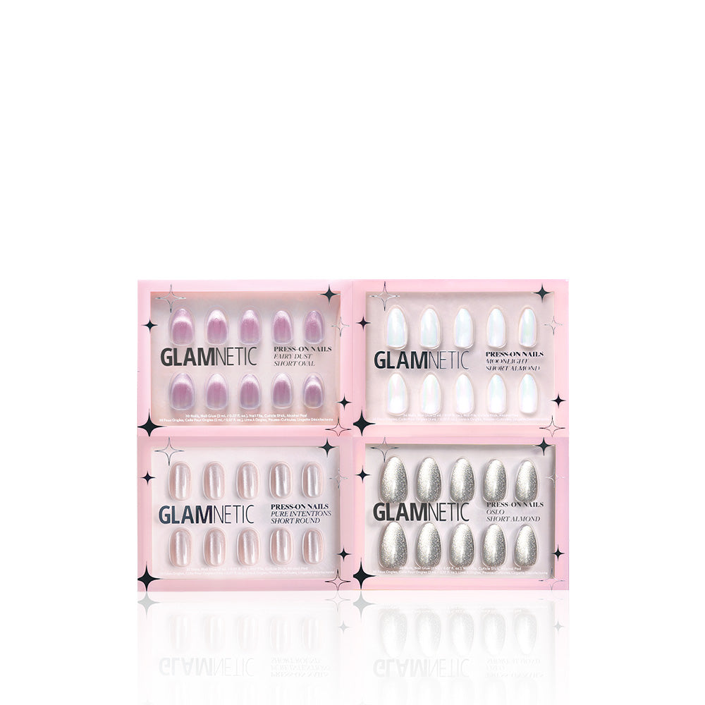 Four sets of glamnetic To the Stars press-on nails in pink packaging are arranged in a square on a white background, featuring pink, white, and silver tones.