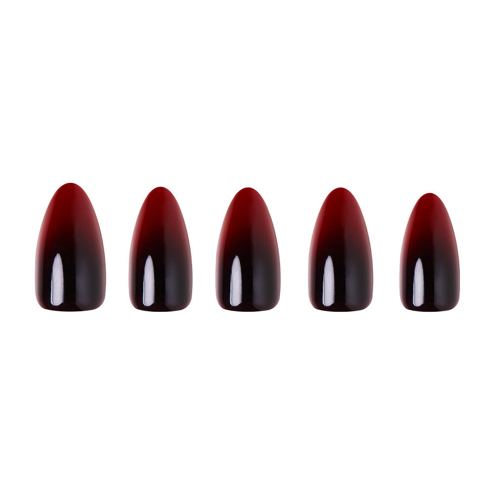 Five glossy, black-to-blood ombre nails from glamnetic’s Vampiress set are arranged in a horizontal row on a white background, creating the perfect set for striking Halloween nails. - Product image