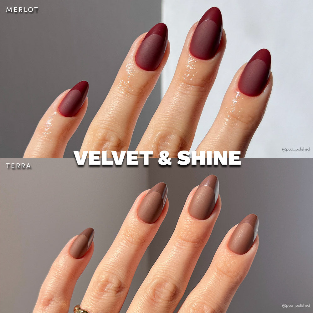 Close-up of glamnetic Velvet & Shine short almond nails: top shows deep red (Merlot), bottom shows earthy-brown matte (Terra). Both vegan, cruelty-free sets feature two matte and two shiny nails. Text: VELVET & SHINE.