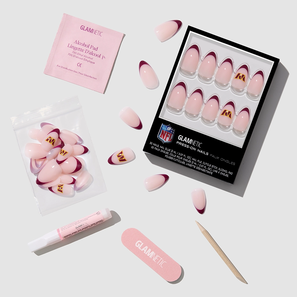 The glamnetic Washington Commanders Press-On Nail Set features burgundy French tip nails with a gold NFL logo, plus alcohol pad, nail glue, buffer, cuticle stick, and extra nails—perfect for any Commanders fan!. - Product image
