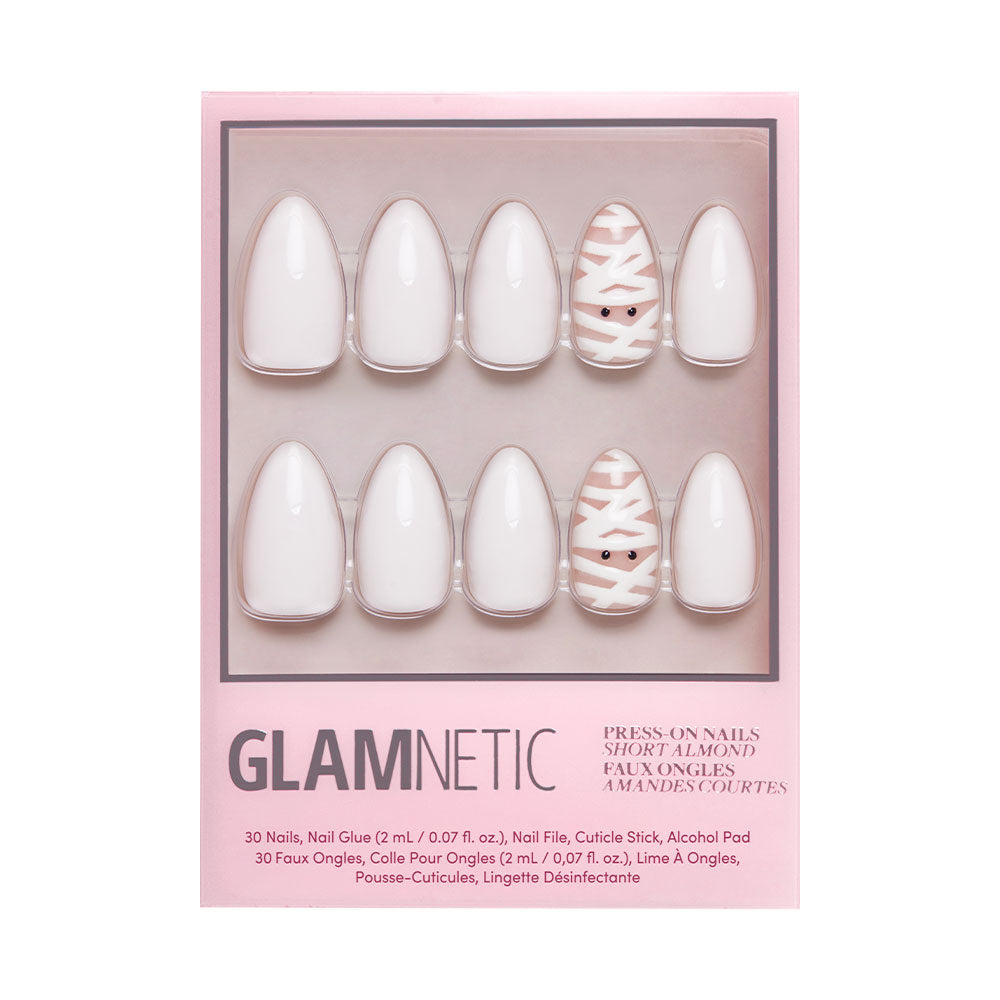 A box of glamnetic Wrapped Up press-on nails in a short almond shape, featuring glossy pale pink nails with white tips and two accent nails with a white and pink abstract squiggle design.