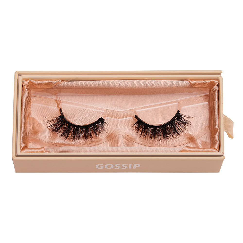 Glamnetic’s Gossip lashes, crafted from Japanese high-quality synthetic fiber, come in a light peach box lined with satin. GOSSIP is printed inside the box. - Product image