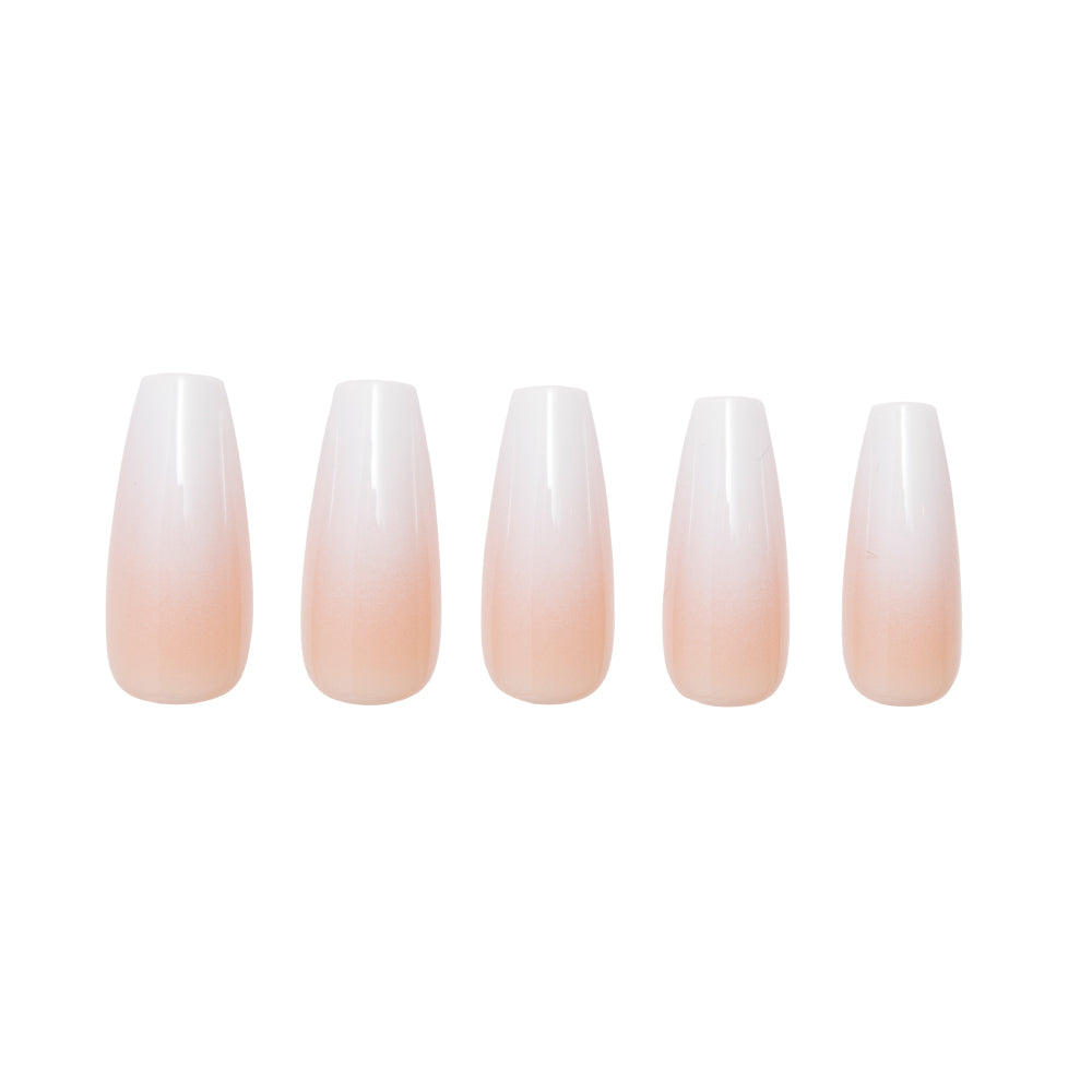 Five Creme de Nude artificial nails by glamnetic, arranged in a row, showcase a glossy nude-to-white ombre gradient and elegant coffin shape, all displayed on a white background. - Product image
