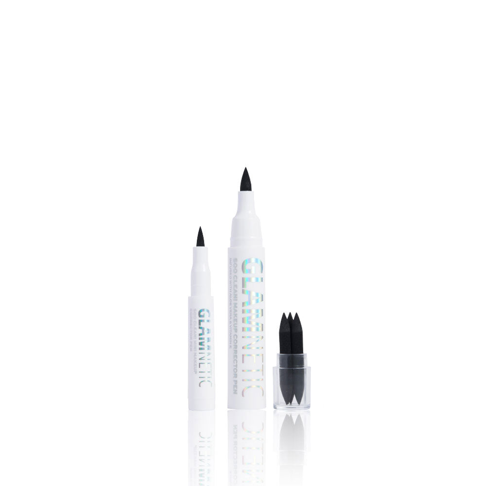 Two white glamnetic Soo Clean! Duo eyeliner pens stand upright—one uncapped to reveal a black felt tip. Nearby, a clear cap holds two spare black replacement tips, all displayed on a plain white background.